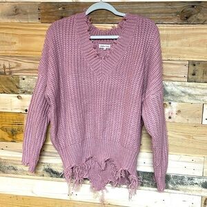 Main Strip size large pink oversized v-neck distress acrylic sweater